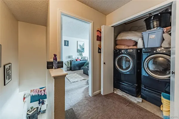 a view of a hallway view with staircase