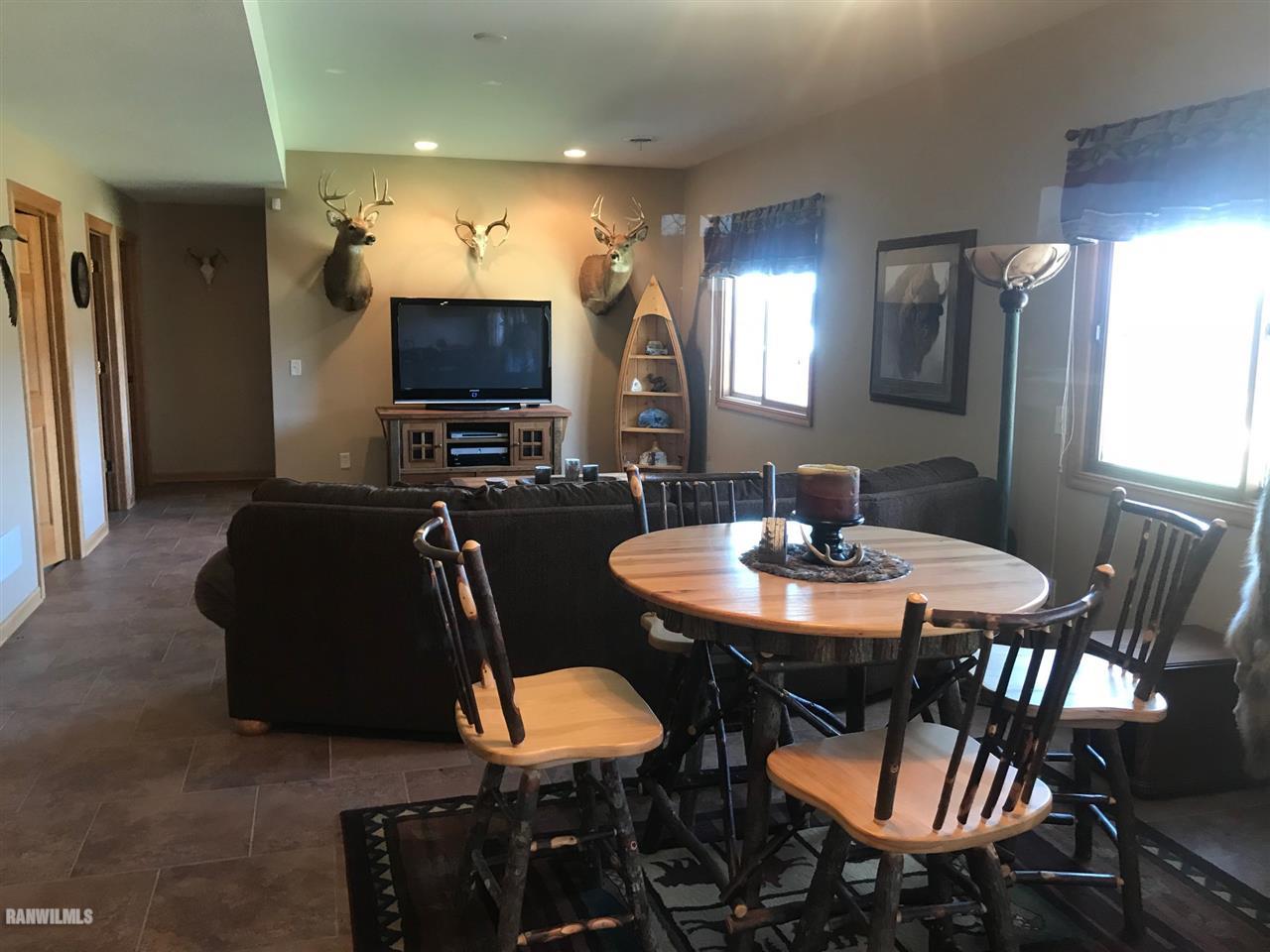 9034 South Gamble Hill Road Elizabeth, IL 61028 - Photo 8 of 24 a view of a dining room with furniture