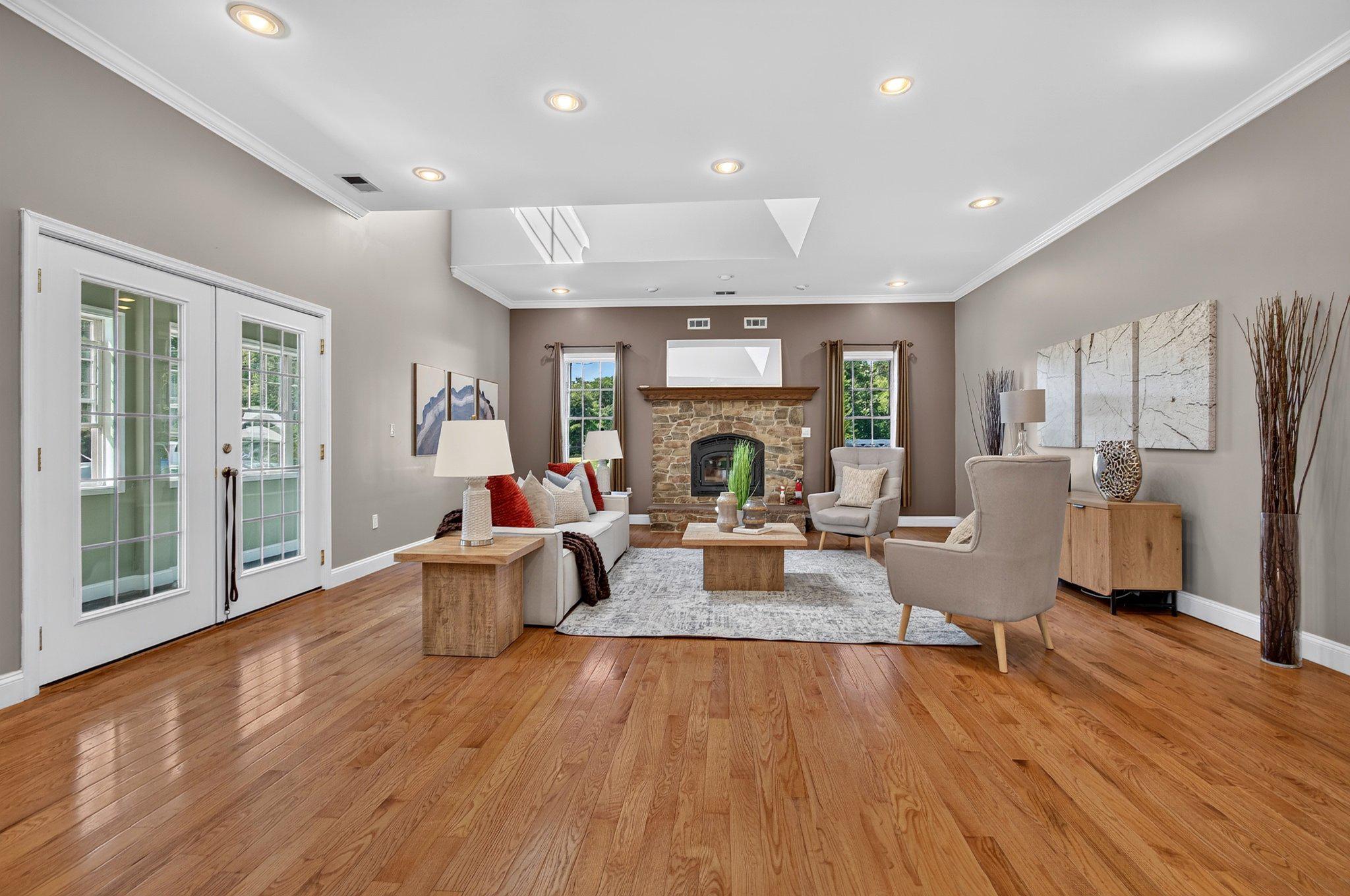 8406 New Cut Road Severn, MD 21144 - Photo 8 of 70 Great room w/ effic. wood burning cast iron stove