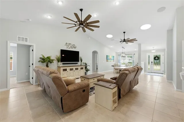 a kitchen with a dining table and chairs