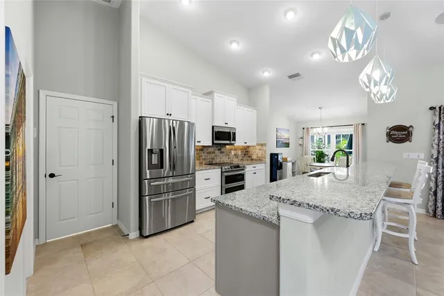 a bedroom with a bed and a cabinets