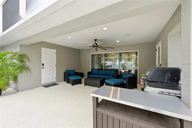 a view of an house with backyard space and balcony