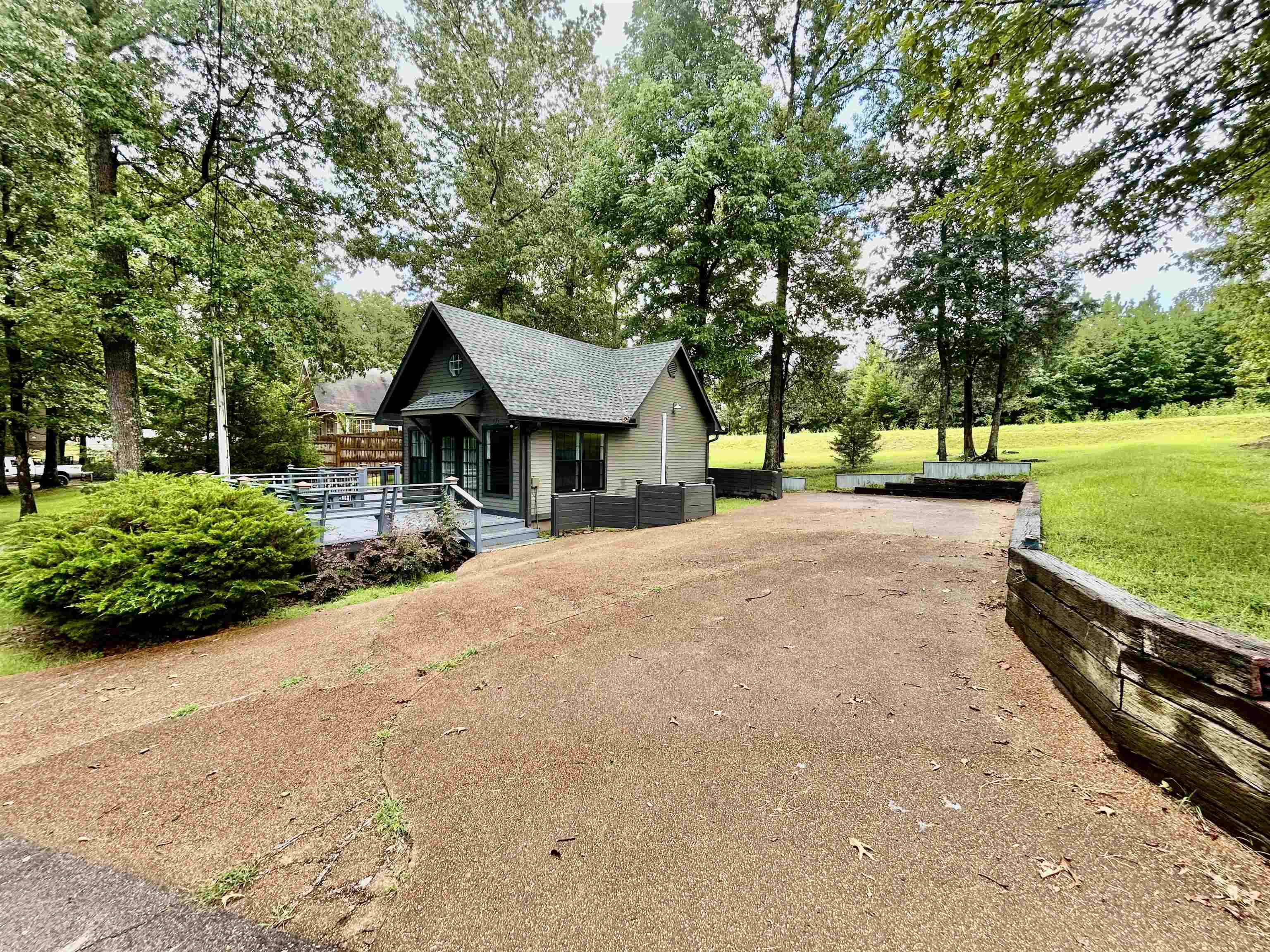 50 Haines Drive Iuka, MS 35616 - Photo 11 of 13 a front view of a house with yard and green space