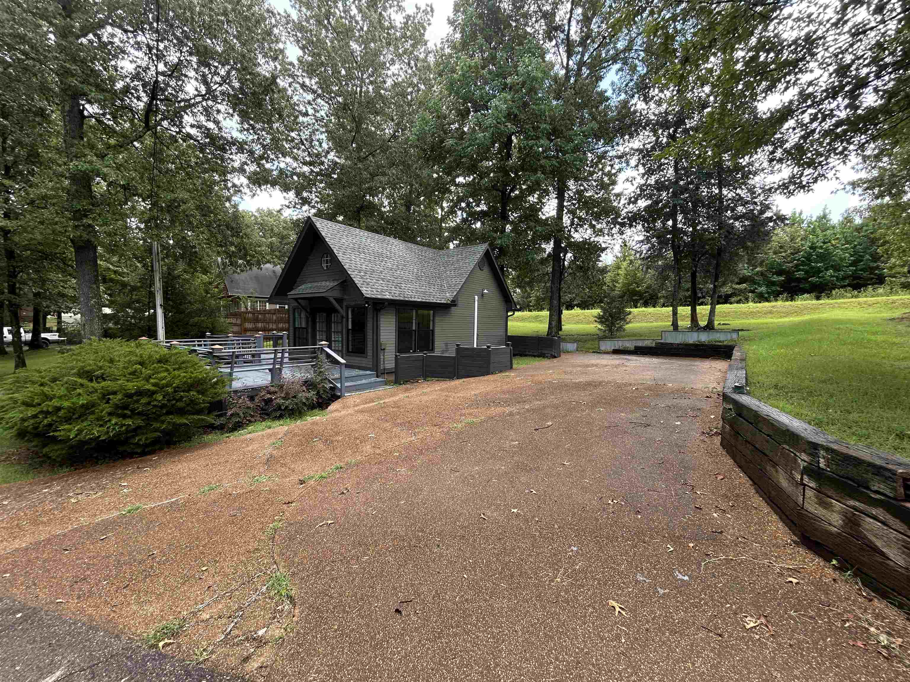 50 Haines Drive Iuka, MS 35616 - Photo 2 of 13 a house with trees in the background