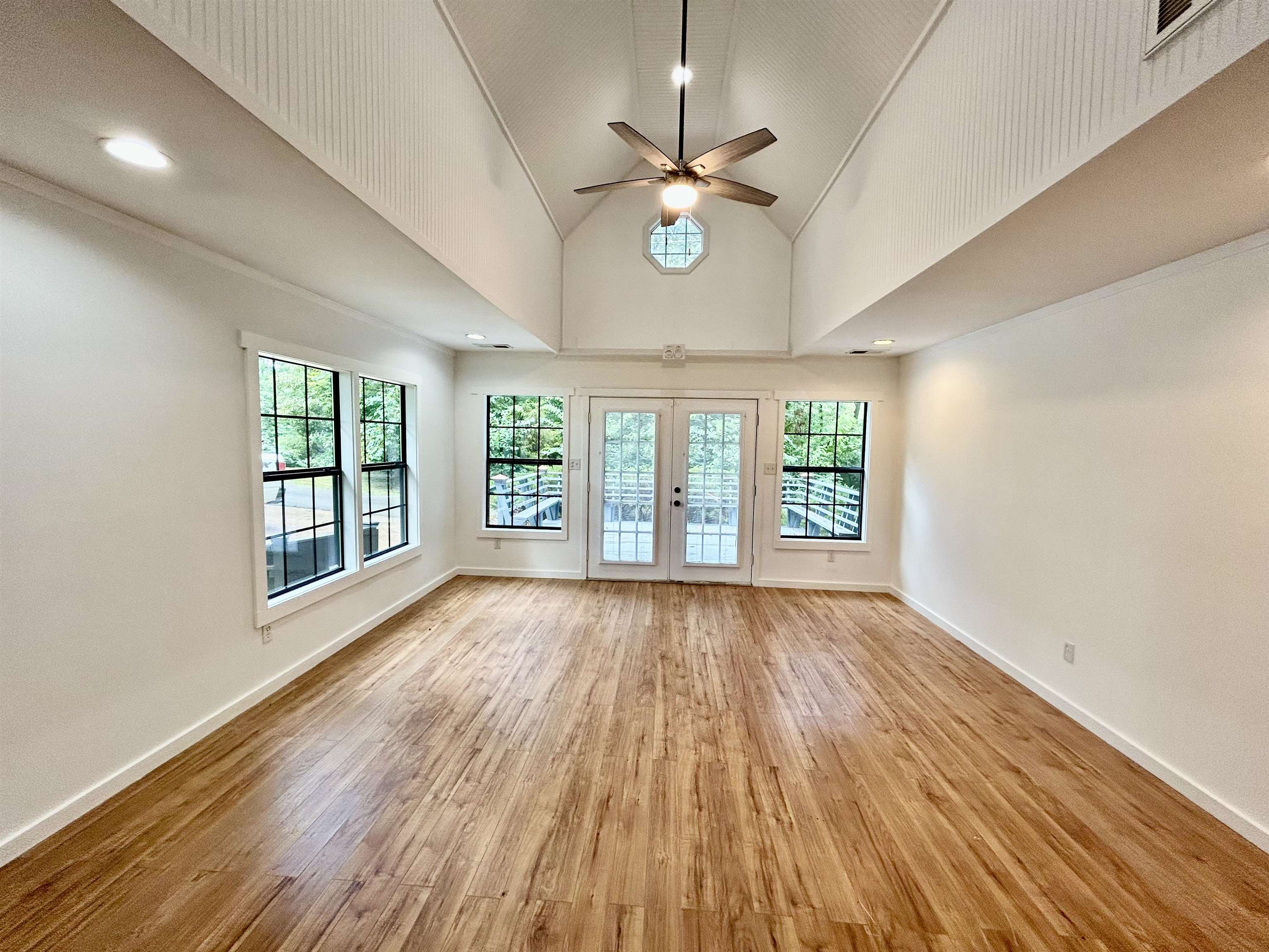 50 Haines Drive Iuka, MS 35616 - Photo 6 of 13 a view of an empty room with wooden floor and a window