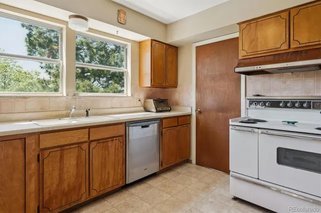 a bed room with a bed and a mirror