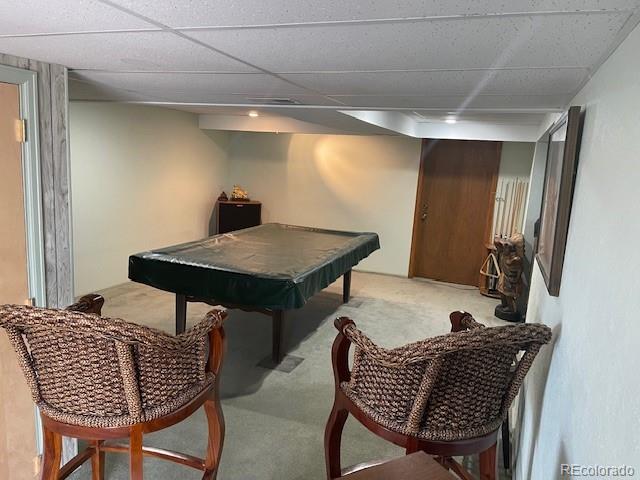 2938 West Wolfensberger Road Sedalia, CO 80135 - Photo 44 of 50 a room with furniture and window