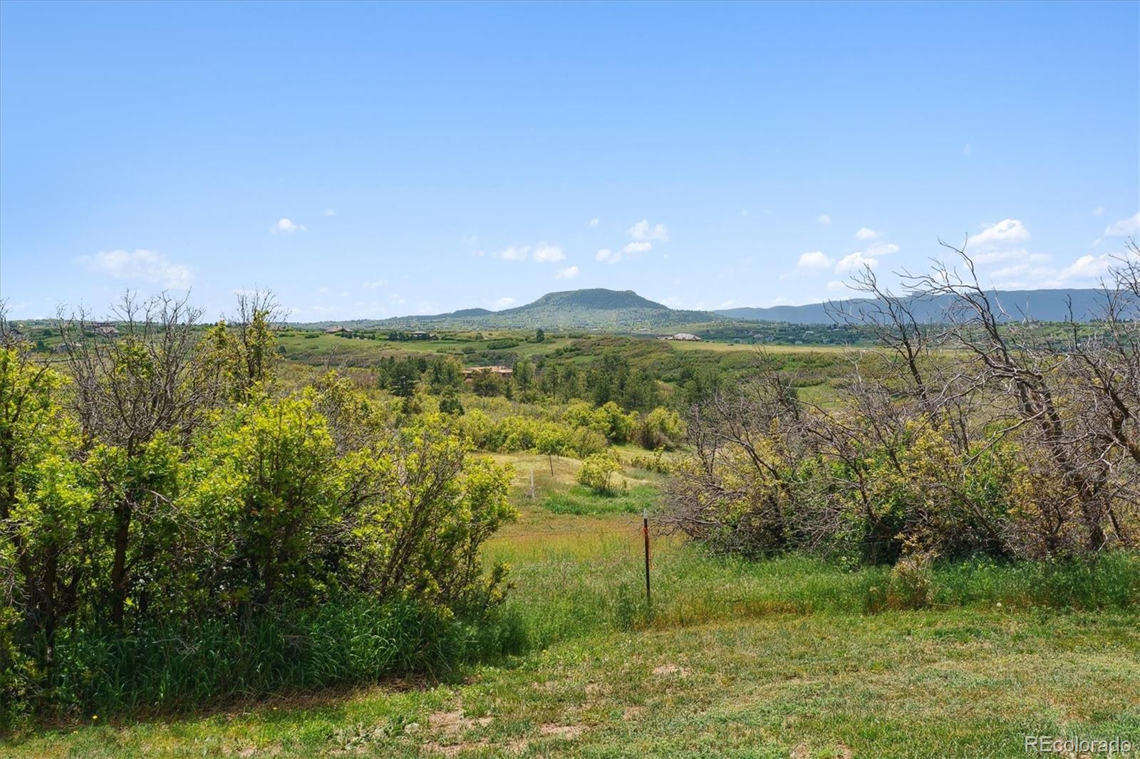 2938 West Wolfensberger Road Sedalia, CO 80135 - Photo 6 of 50 a view of a garden
