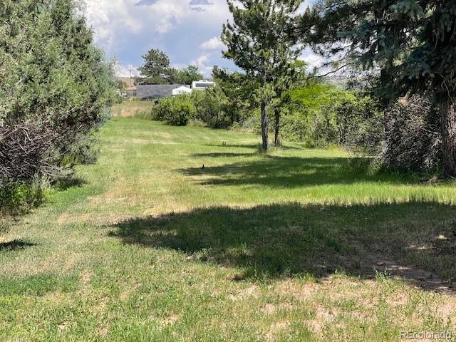2938 West Wolfensberger Road Sedalia, CO 80135 - Photo 7 of 50 a view of a garden