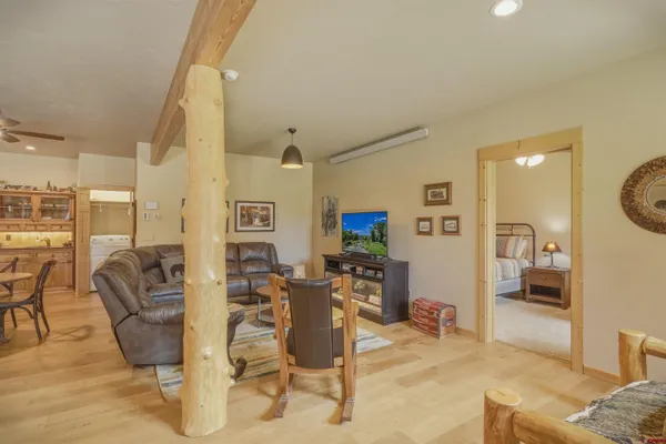 a living room with furniture and a table