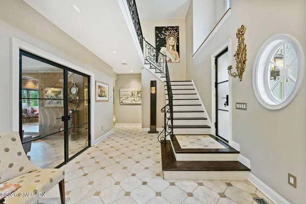 a living room with furniture and a window