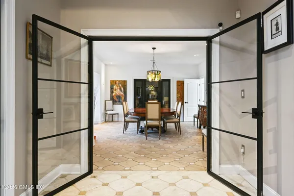 a kitchen with stainless steel appliances a sink stove and refrigerator