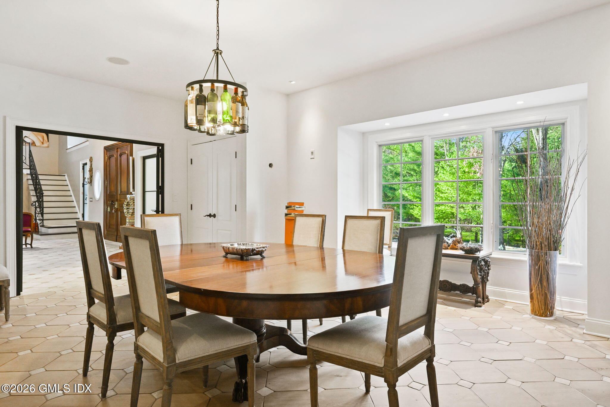 367 Riversville Road Greenwich, CT 06831 - Photo 21 of 66 a view of a dining room with furniture window and outside view