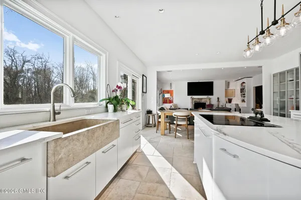 a bedroom with a bed and a desk