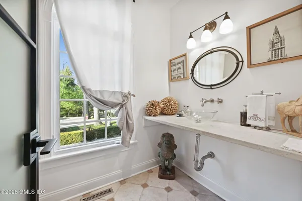 a bathroom with a sink a toilet and a bathtub