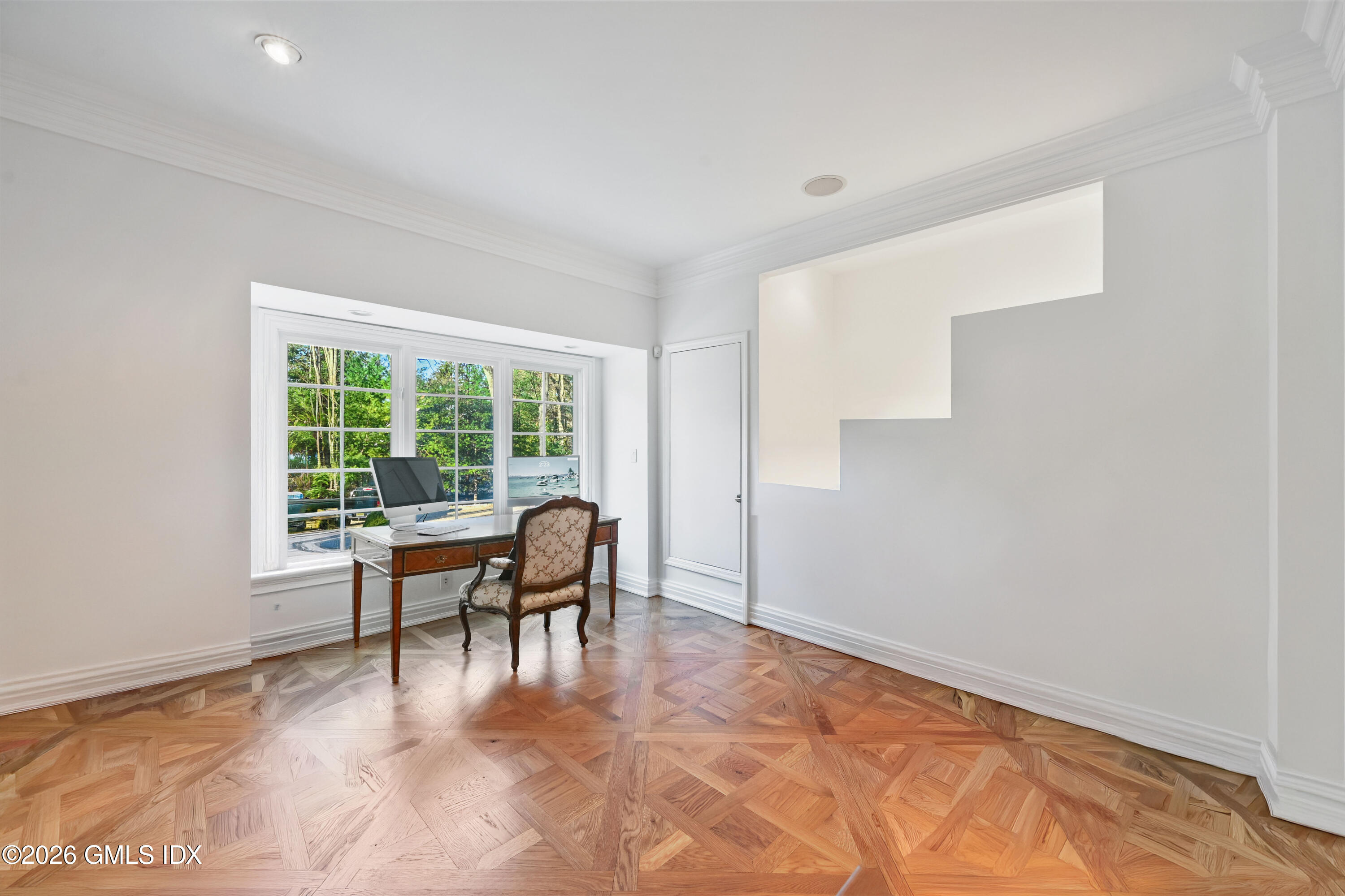 367 Riversville Road Greenwich, CT 06831 - Photo 34 of 66 a view of a workspace with furniture and a window
