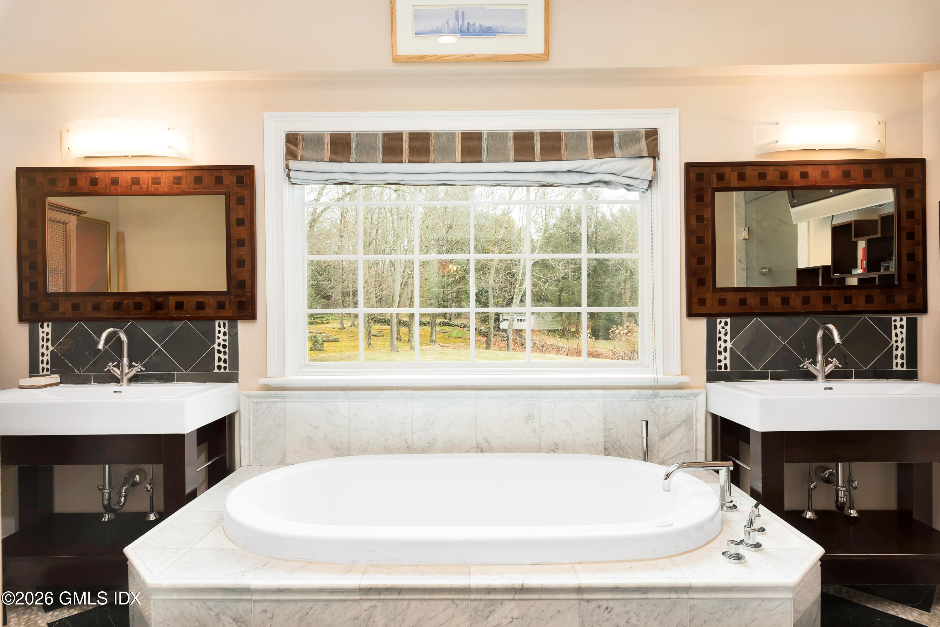 367 Riversville Road Greenwich, CT 06831 - Photo 37 of 66 a bathroom with a tub a sink and a large mirror