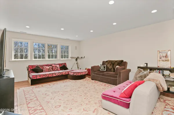 a view of a house with a yard and garage