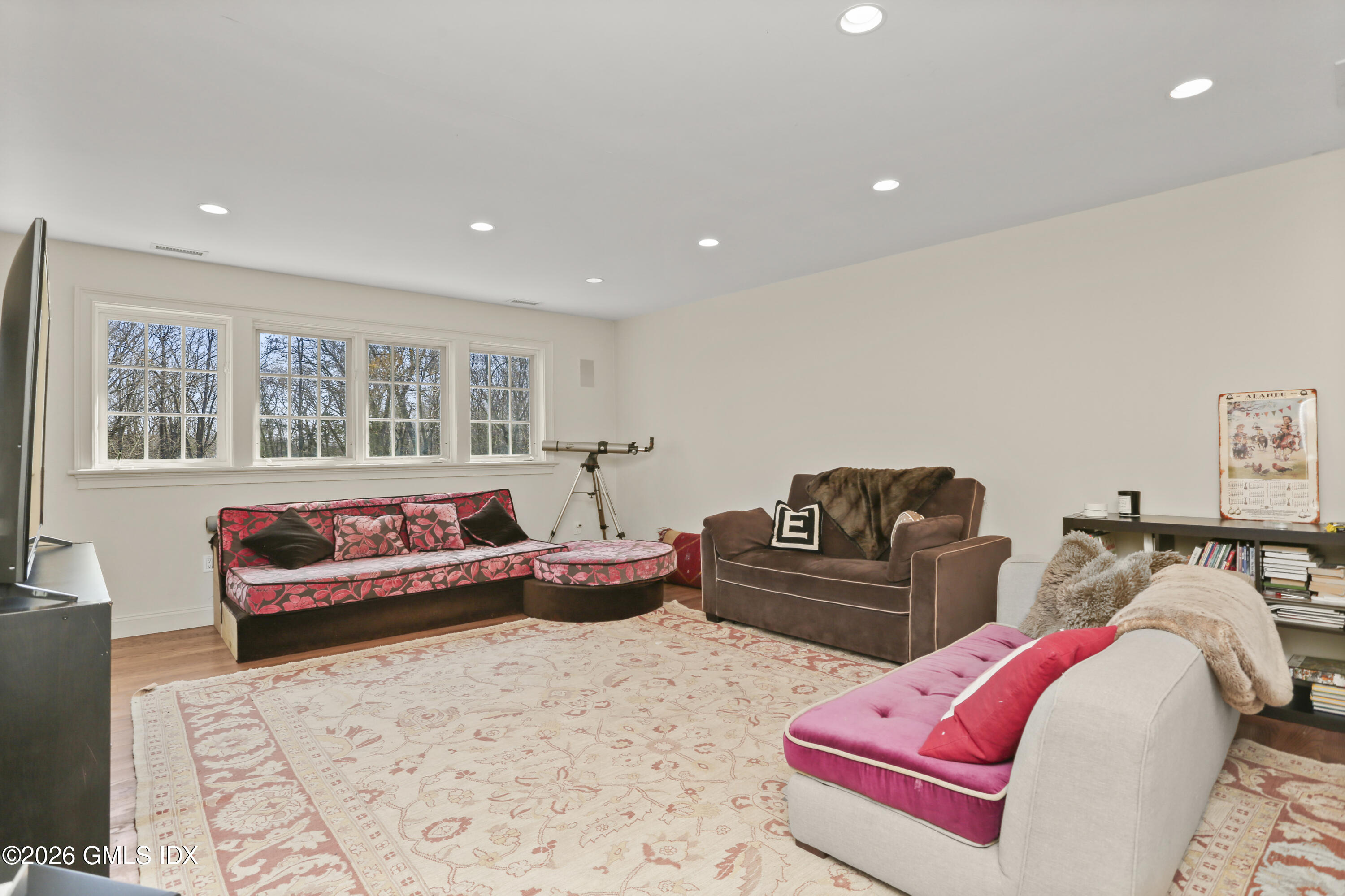 367 Riversville Road Greenwich, CT 06831 - Photo 46 of 66 a living room with furniture and painting on the wall