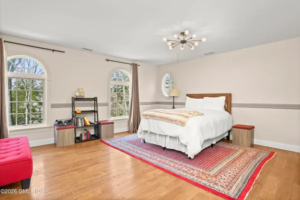 a view of a backyard with sitting area