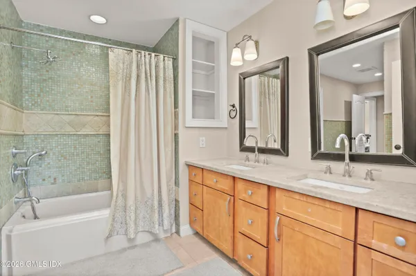 a view of a park with large trees