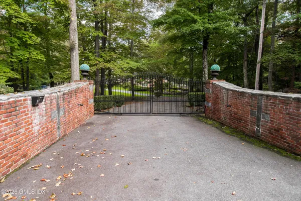 a view of a house with a balcony and windows