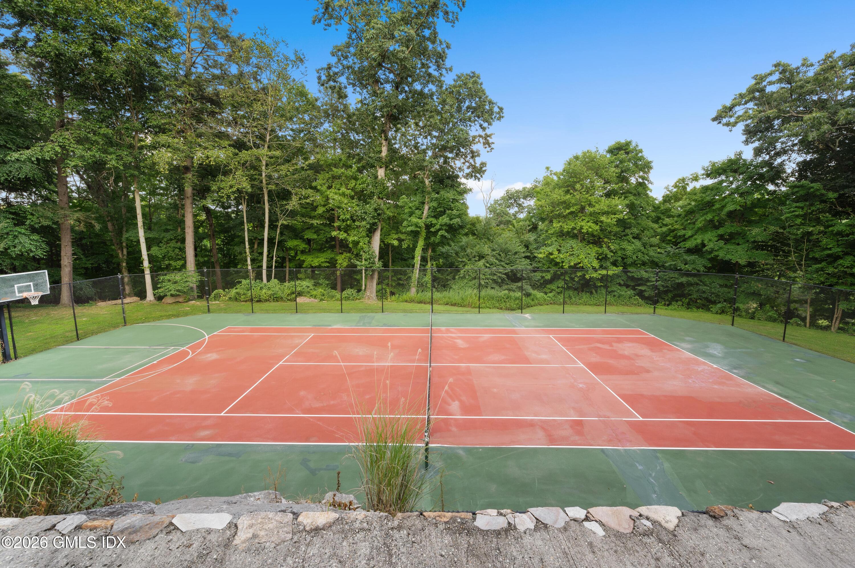 367 Riversville Road Greenwich, CT 06831 - Photo 58 of 66 a view of a tennis court