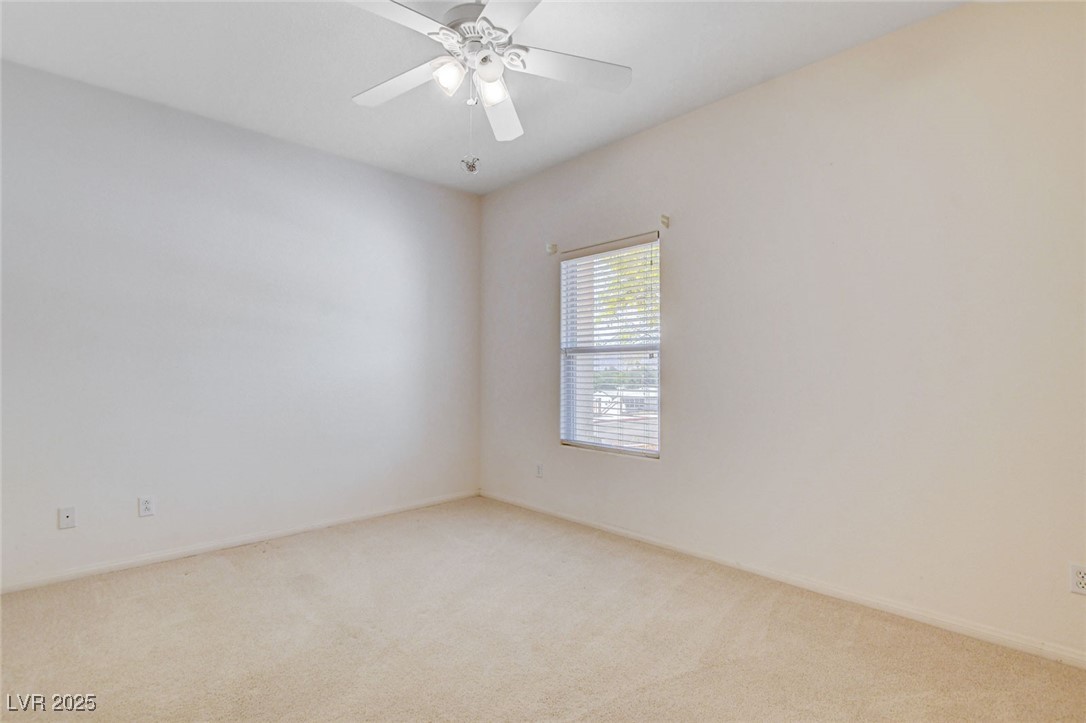 1104 Endora Way Boulder City, NV 89005 - Photo 16 of 36 Spare room featuring carpet flooring and baseboards