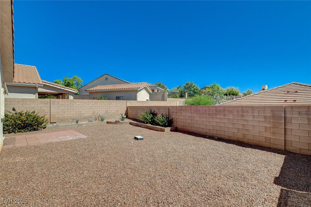 1104 Endora Way Boulder City, NV 89005 - Photo 29 of 36 View of fenced backyard