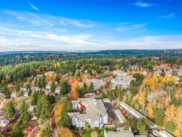 a view of a city with mountains in the background