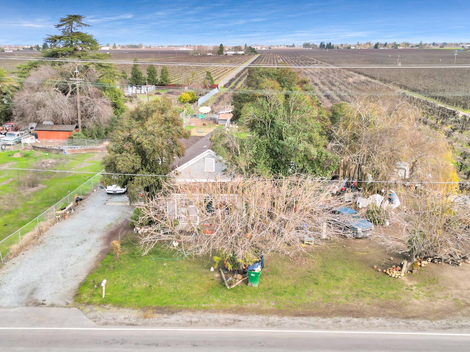 20388 Highway 99 Acampo, CA 95220 - Photo 12 of 24 an aerial view of residential houses with outdoor space