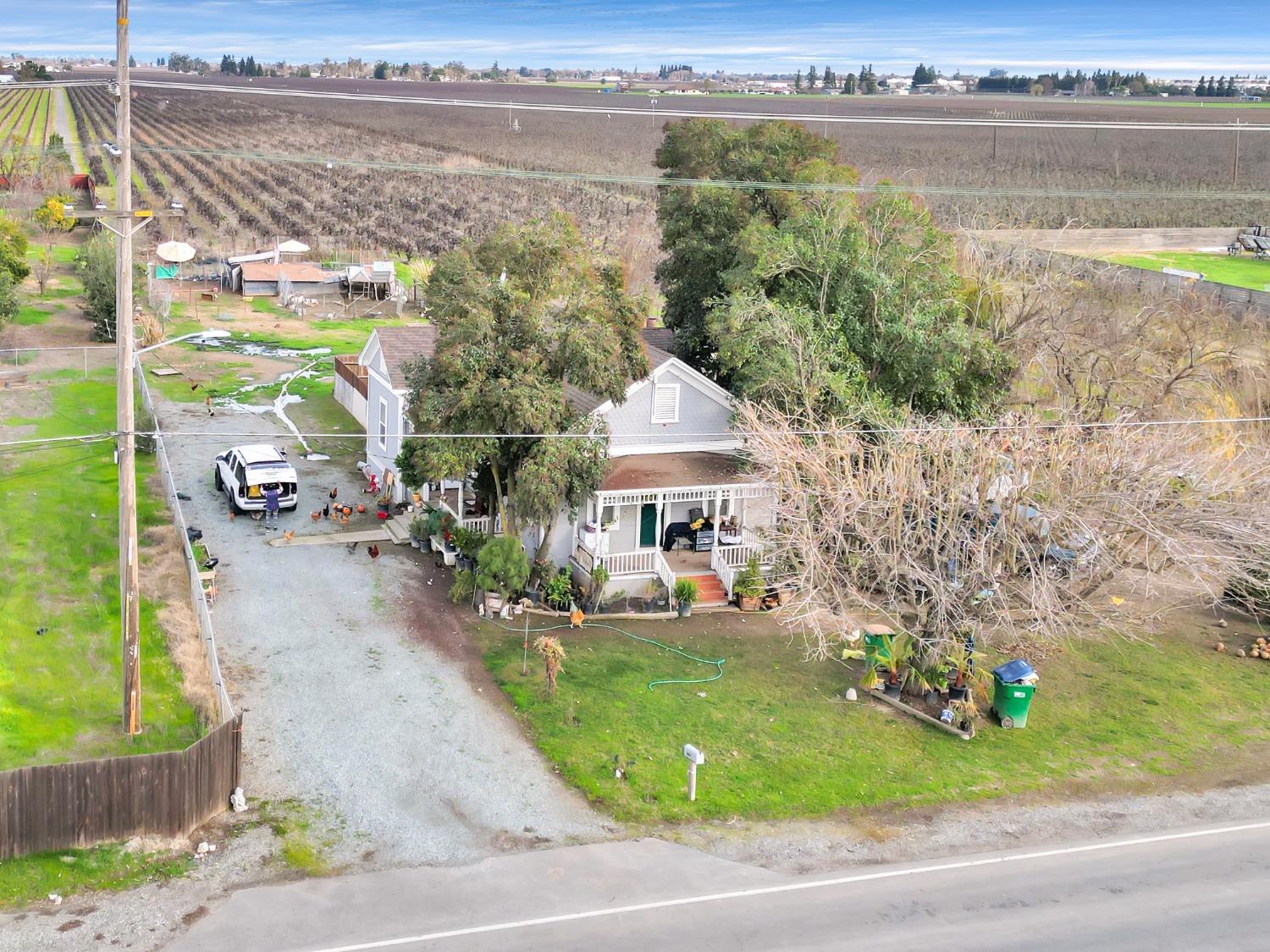 20388 Highway 99 Acampo, CA 95220 - Photo 13 of 24 a view of a house with a ocean view