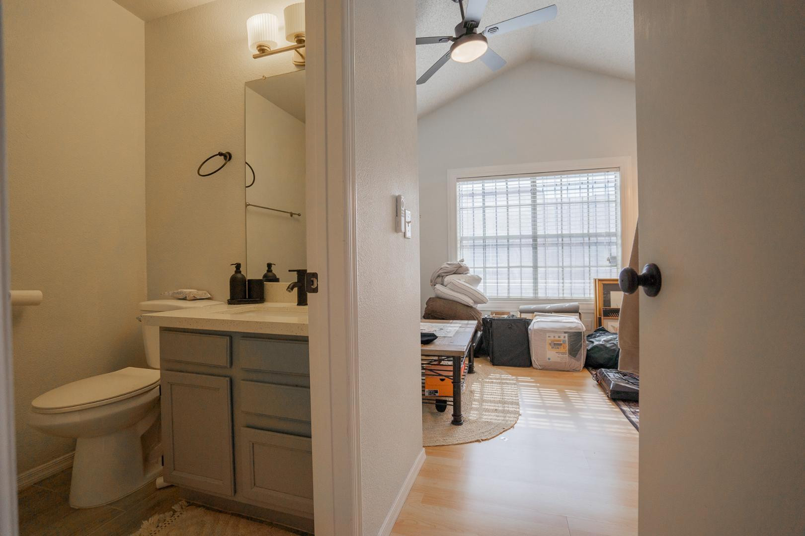 8111 West Wacker Road, Unit 70 Peoria, AZ 85381 - Photo 21 of 38 a bath room with a toilet a sink and a bath tub