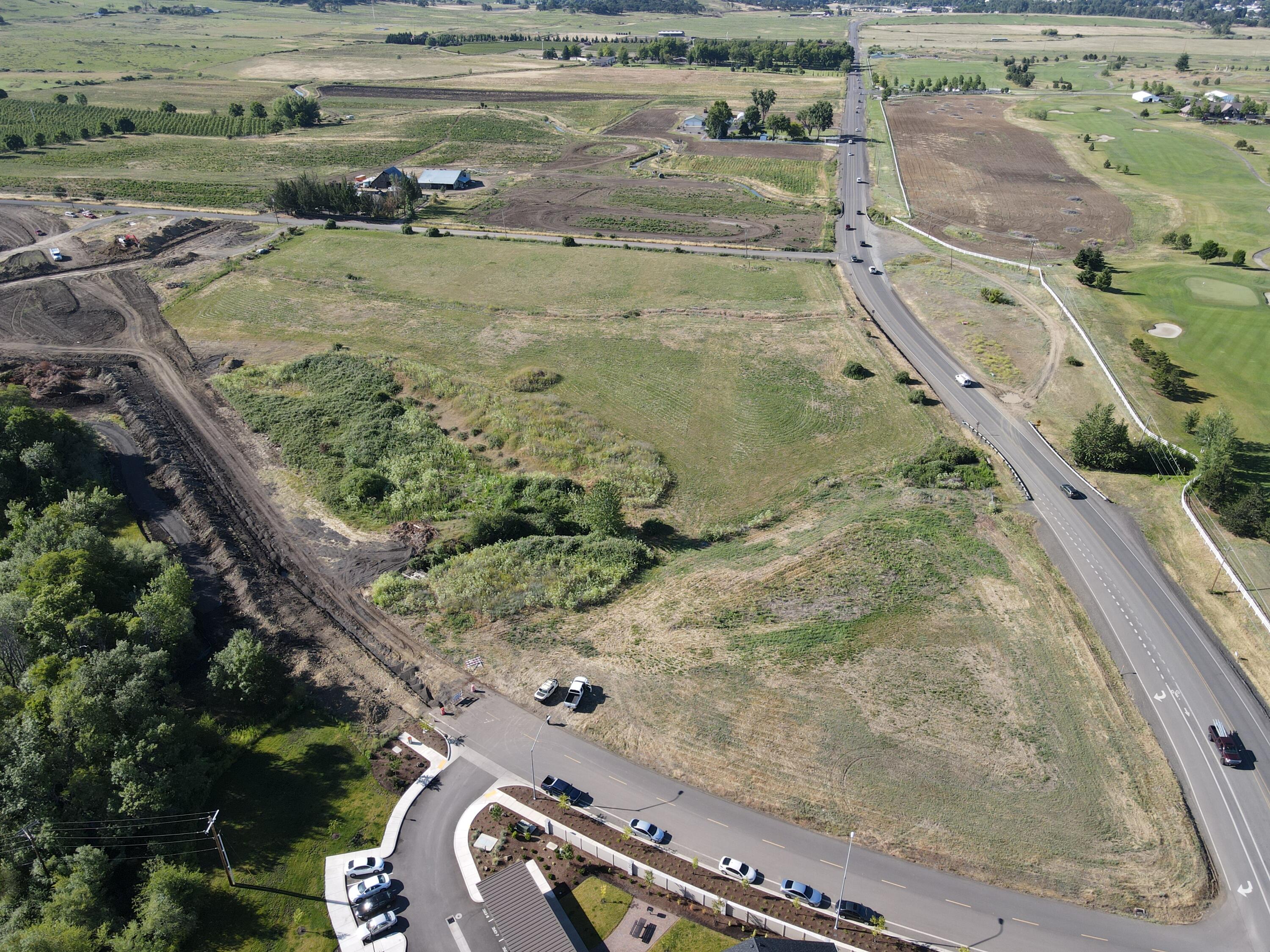 0 North Phoenix Road Medford, OR 97504 - Photo 4 of 10 an aerial view of a residential houses with outdoor space