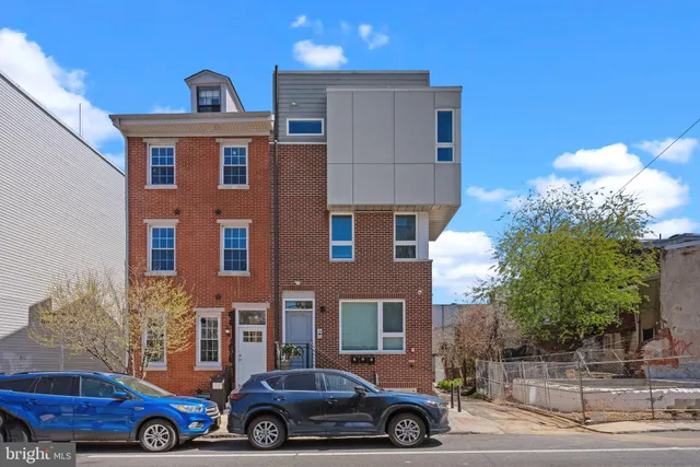 a car parked in front of a building