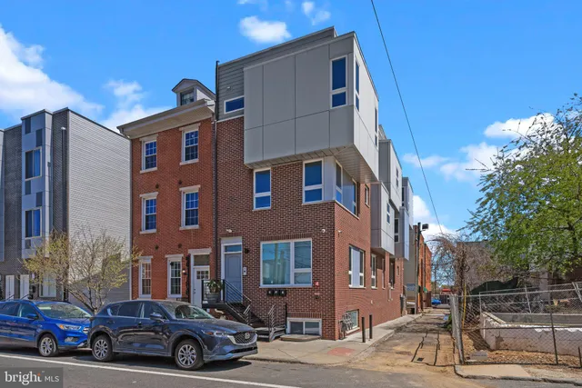 a car parked in front of a building
