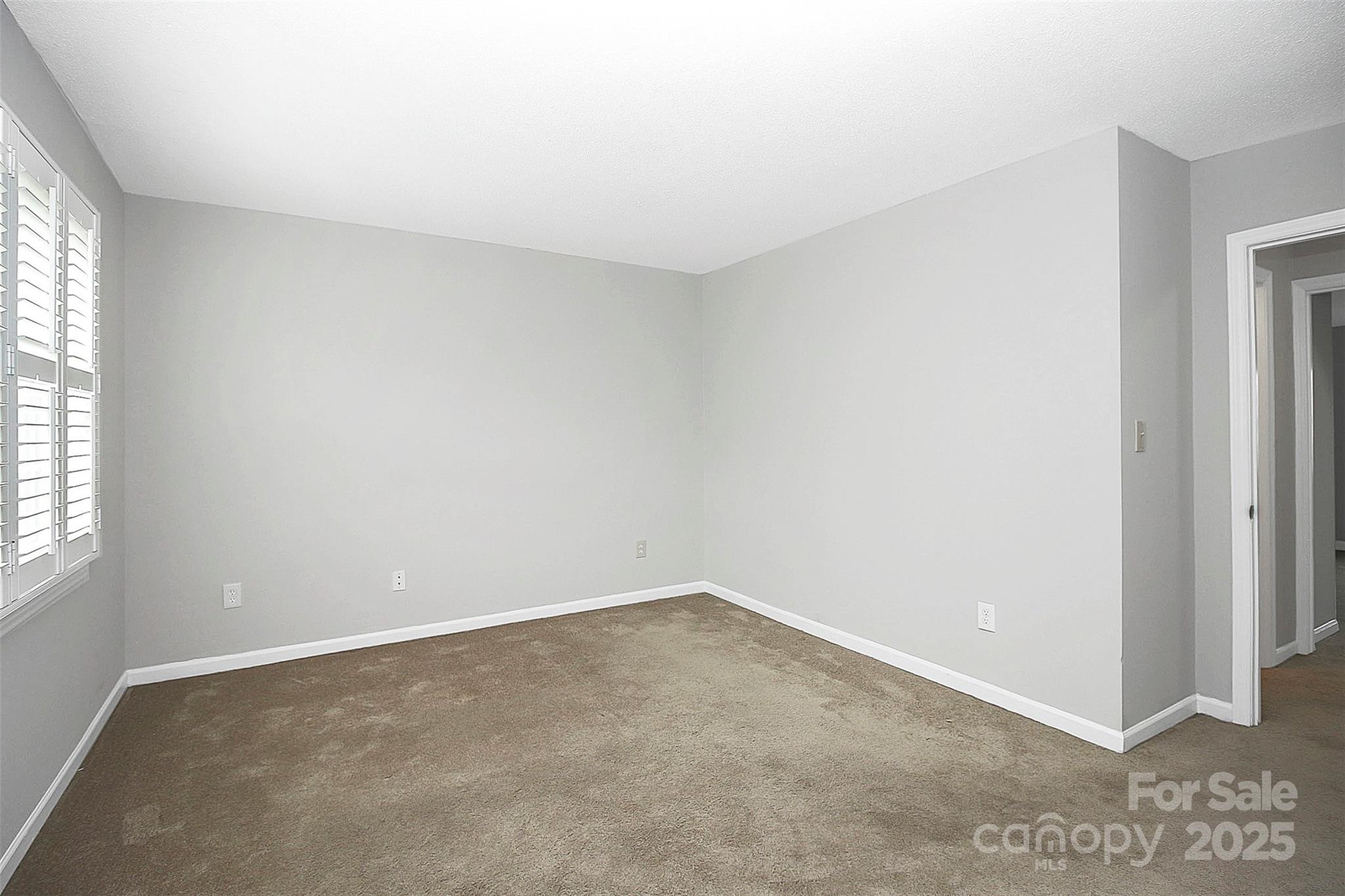 11111 Park Road Charlotte, NC 28226 - Photo 14 of 20 an empty room with a window