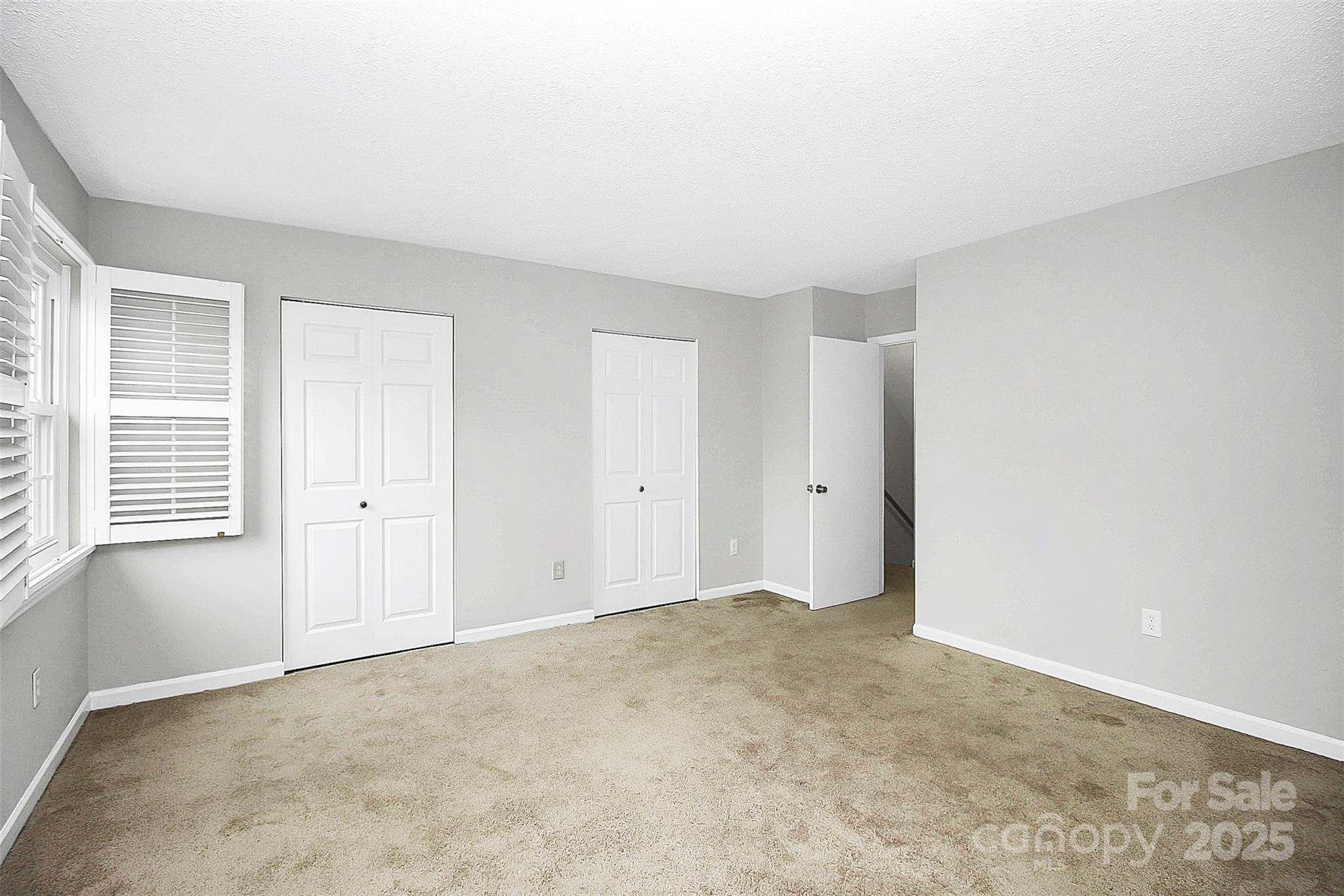 11111 Park Road Charlotte, NC 28226 - Photo 16 of 20 a view of an empty room with a window