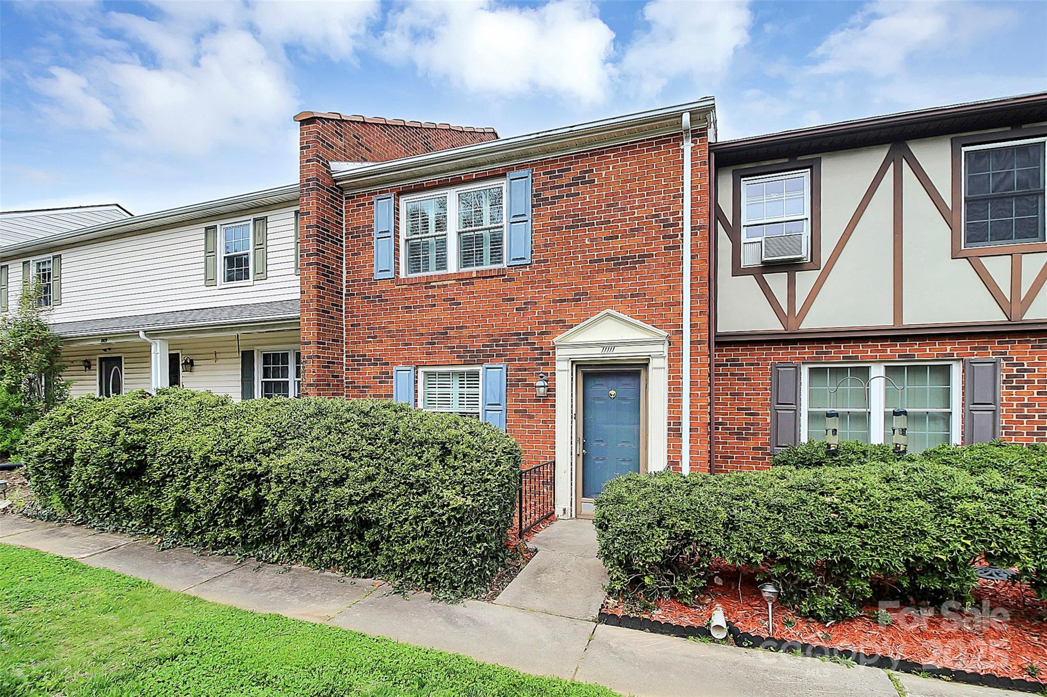 11111 Park Road Charlotte, NC 28226 - Photo 2 of 20 front view of a brick house with a large window