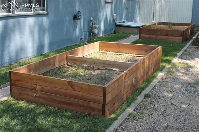 607 Alexander Road Colorado Springs, CO 80909 - Photo 8 of 26 Raised flower beds