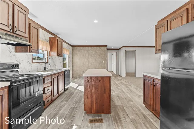 a bathroom with a window and a shower