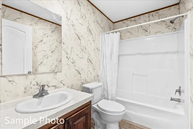 a bathroom with a sink and a toilet