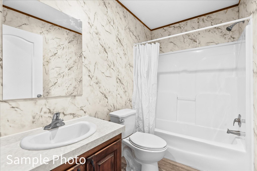 232 Brandon Circle Chatsworth, GA 30705 - Photo 15 of 37 a bathroom with a sink and a mirror