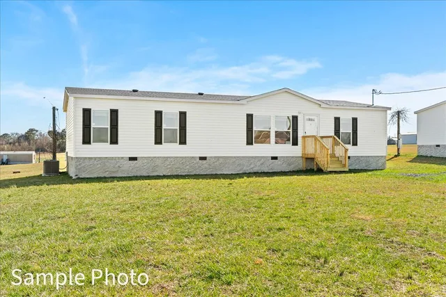 a house view with a garden space