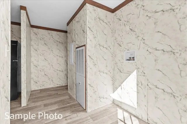 a kitchen with a refrigerator and a sink