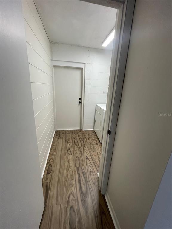 4486 Southwest 159th Court Ocala, FL 34481 - Photo 20 of 21 a view of a hallway with wooden floor and staircase