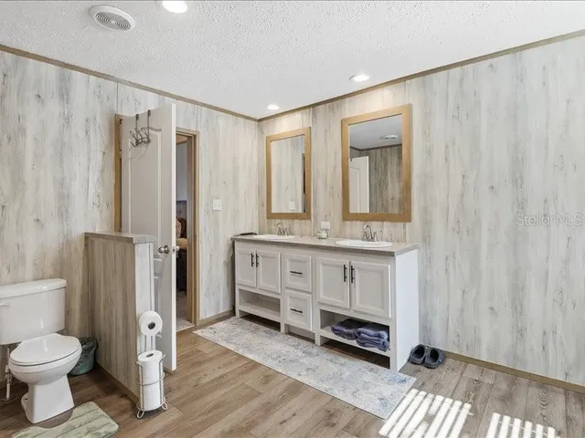 a bathroom with a sink and a shower curtain
