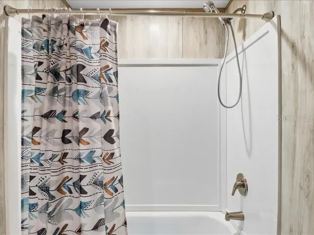 a kitchen with a stove and a refrigerator