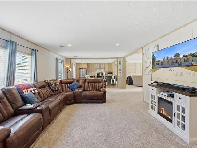 a living room with a couch and a window