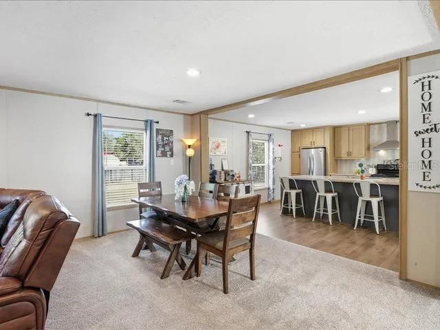 a view of a dining room with furniture